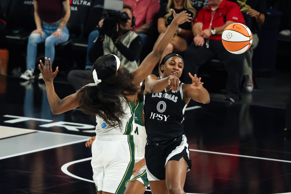 Las Vegas Aces guard Jackie Young (0) passes the ball guarded by Seattle Storm guard Flau'jae Johnson (4) in the third quarter of the WNBA game on Sunday, September 20, 2026, at Michelob ULTRA Arena in Las Vegas, Nevada. Las Vegas Aces guard Jackie Young (0) passes the ball guarded by Seattle Storm guard Flau'jae Johnson (4) in the third quarter of the WNBA game on Sunday, September 20, 2026, at Michelob ULTRA Arena in Las Vegas, Nevada.