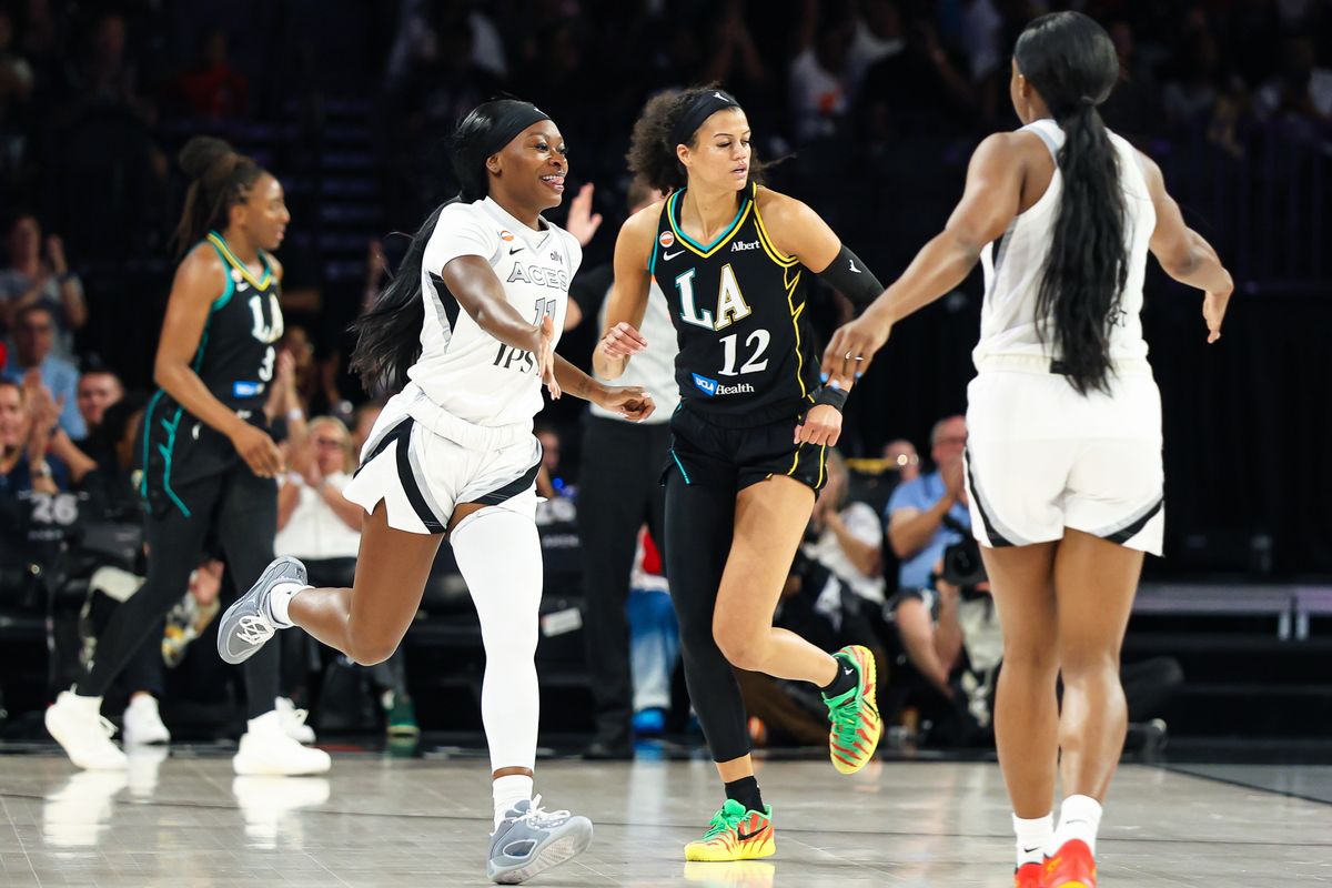 Las Vegas Aces guard Dana Evans (11) reacts after making a three-point basket in the second quarter of the WNBA game against the Los Angeles Sparks on Tuesday, September 22, 2026, at Michelob ULTRA Arena in Las Vegas, Nevada. Las Vegas Aces guard Dana Evans (11) reacts after making a three-point basket in the second quarter of the WNBA game against the Los Angeles Sparks on Tuesday, September 22, 2026, at Michelob ULTRA Arena in Las Vegas, Nevada.
