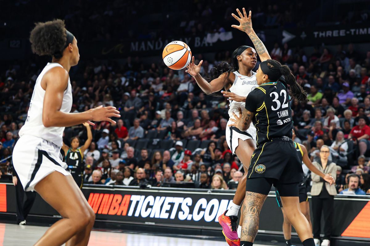 Las Vegas Aces guard Jackie Young (0) makes a no-look pass to Las Vegas Aces forward/center Brianna Turner (21) for an assist in the third quarter of the WNBA game against the Los Angeles Sparks on Tuesday, September 22, 2026, at Michelob ULTRA Arena in Las Vegas, Nevada. Las Vegas Aces guard Jackie Young (0) makes a no-look pass to Las Vegas Aces forward/center Brianna Turner (21) for an assist in the third quarter of the WNBA game against the Los Angeles Sparks on Tuesday, September 22, 2026, at Michelob ULTRA Arena in Las Vegas, Nevada.