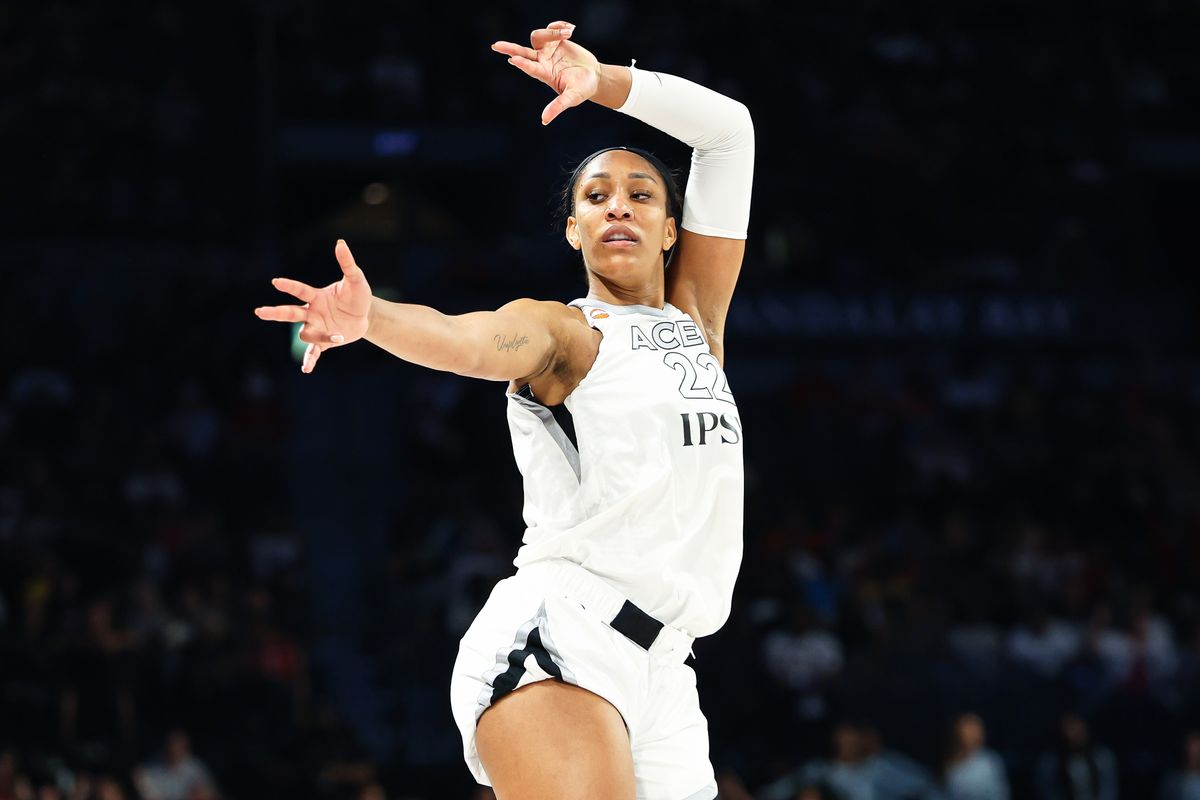 Las Vegas Aces center A'ja Wilson (22) hits her signature move after scoring a three-point basket in the third quarter of the WNBA game against the Los Angeles Sparks on Tuesday, September 22, 2026, at Michelob ULTRA Arena in Las Vegas, Nevada. Las Vegas Aces center A'ja Wilson (22) hits her signature move after scoring a three-point basket in the third quarter of the WNBA game against the Los Angeles Sparks on Tuesday, September 22, 2026, at Michelob ULTRA Arena in Las Vegas, Nevada.