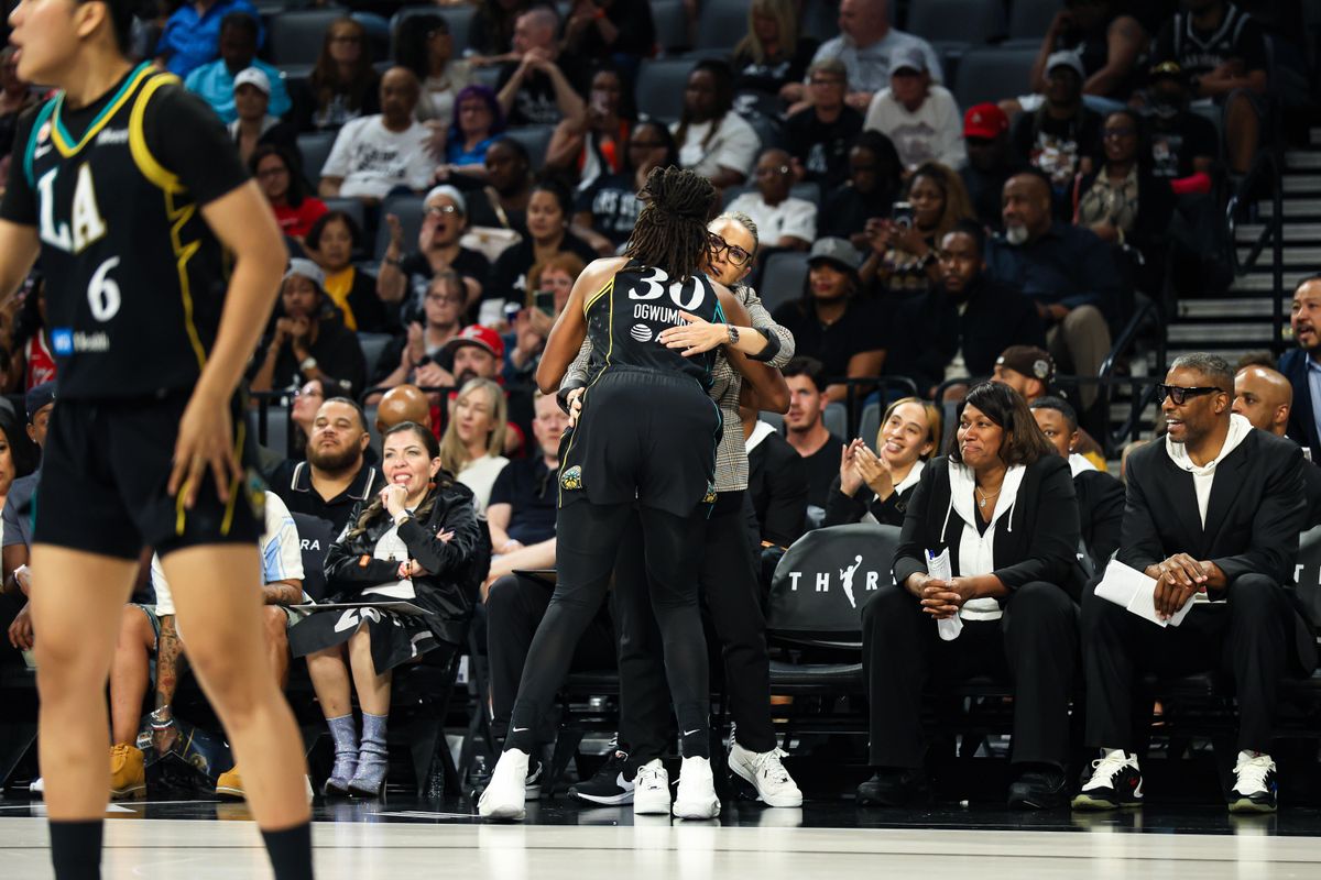 Los Angeles Sparks forward Nneka Ogwumike (30) embraces Las Vegas Aces head coach Becky Hammon after she leaves the court for the last time in Las Vegas on Tuesday, September 22, 2026, at Michelob ULTRA Arena in Las Vegas, Nevada. Los Angeles Sparks forward Nneka Ogwumike (30) embraces Las Vegas Aces head coach Becky Hammon after she leaves the court for the last time in Las Vegas on Tuesday, September 22, 2026, at Michelob ULTRA Arena in Las Vegas, Nevada.