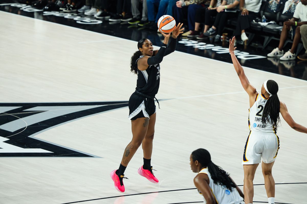Las Vegas Aces forward Cheyenne Parker-Tyus (32) scores a three-point basket in the third quarter of Round 1 Game 1 of the 2026 WNBA Playoffs against the Indiana Fever on Sunday, September 27, 2026, at Michelob ULTRA Arena in Las Vegas, Nevada.