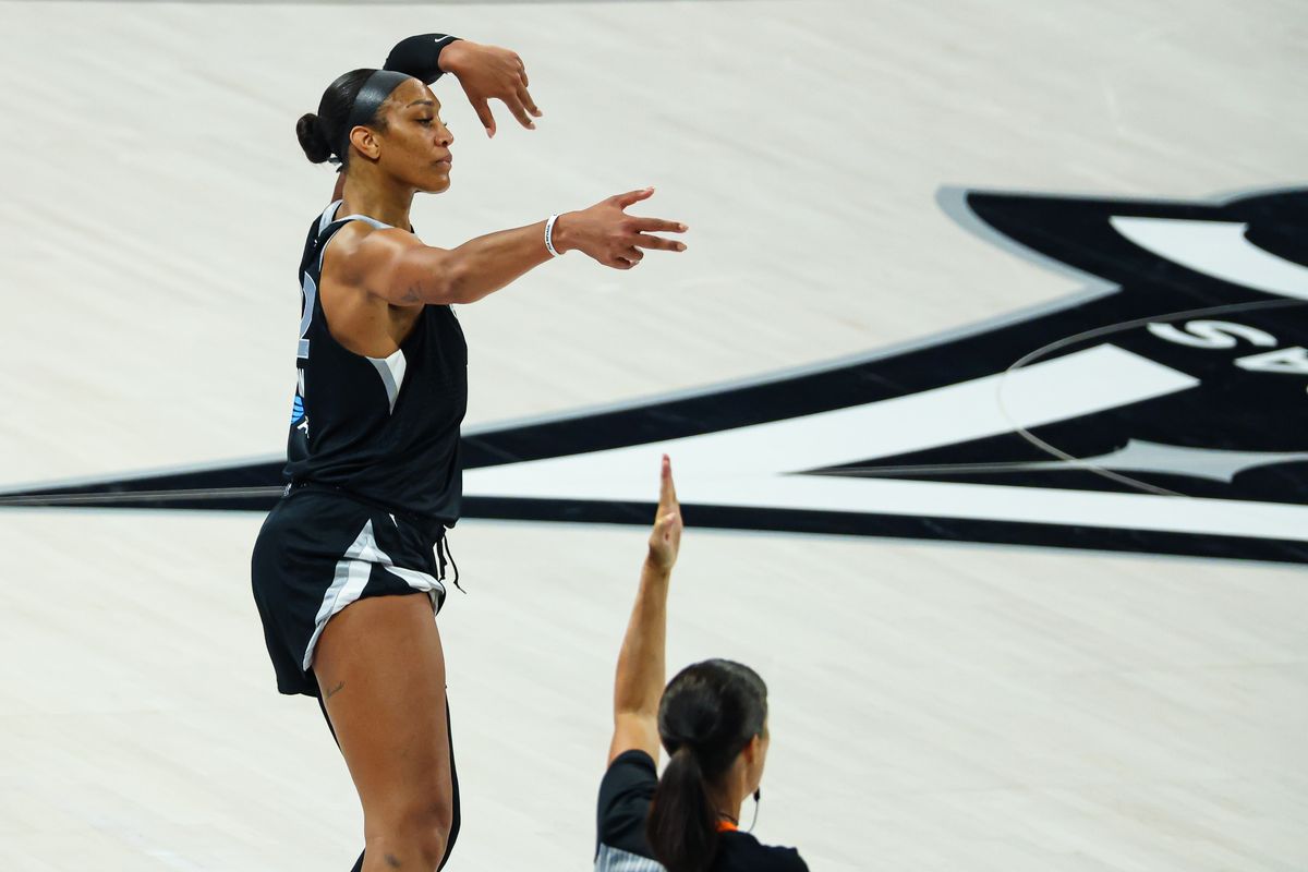 Las Vegas Aces center A'ja Wilson (22) reacts after scoring a three-point basket in the third quarter of Round 1 Game 1 of the 2026 WNBA Playoffs against the Indiana Fever on Sunday, September 27, 2026, at Michelob ULTRA Arena in Las Vegas, Nevada.