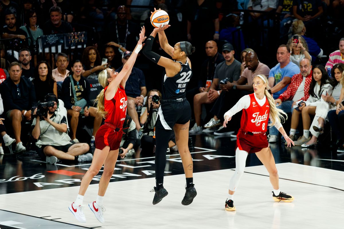 Las Vegas Aces center A’ja Wilson shoots the ball past Indiana Fever guard Lexie Hull during a WNBA Playoff Game on Thursday, October 1, 2026 at Michelob ULTRA Arena in Las Vegas, Nevada.