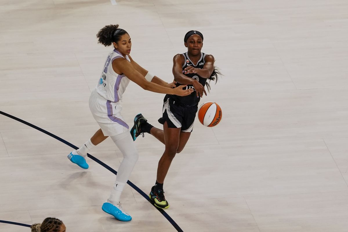 Las Vegas Aces guard Jackie Young (0) passes the ball while guarded by Golden State Valkyries forward Janelle Salaun (13) during first quarter of WNBA game against the Golden State Valkyries on Friday October 9, 2026 at Michelob Ultra Arena in Las Vegas. Las Vegas Aces guard Jackie Young (0) passes the ball while guarded by Golden State Valkyries forward Janelle Salaun (13) during first quarter of WNBA game against the Golden State Valkyries on Friday October 9, 2026 at Michelob Ultra Arena in Las Vegas.