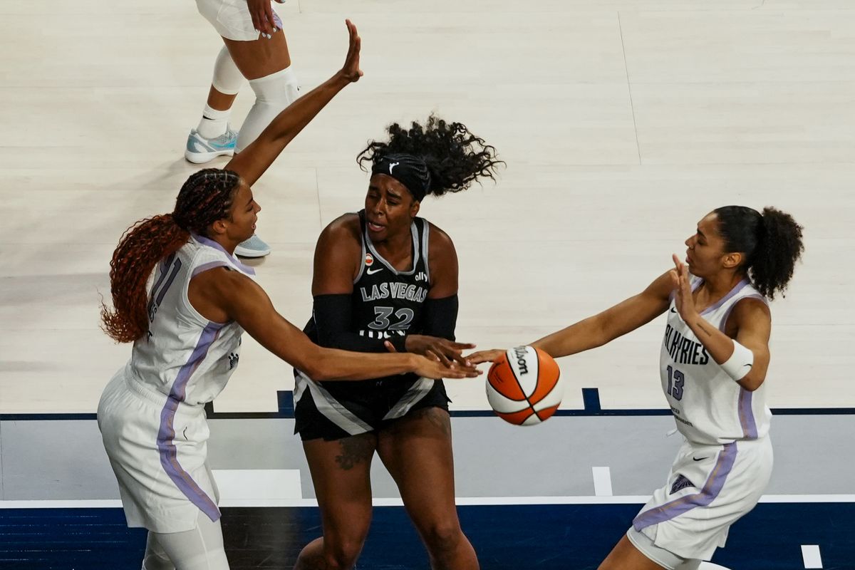 Las Vegas Aces forward CheyenneParker-Tyus (32) loses control of the ball while guarded by Golden State Valkyries center Kia Stokes (41) and Janelle Salaun (13) during first quarter of WNBA game against the Golden State Valkyries on Friday October 9, 2026 at Michelob Ultra Arena in Las Vegas. Las Vegas Aces forward CheyenneParker-Tyus (32) loses control of the ball while guarded by Golden State Valkyries center Kia Stokes (41) and Janelle Salaun (13) during first quarter of WNBA game against the Golden State Valkyries on Friday October 9, 2026 at Michelob Ultra Arena in Las Vegas.