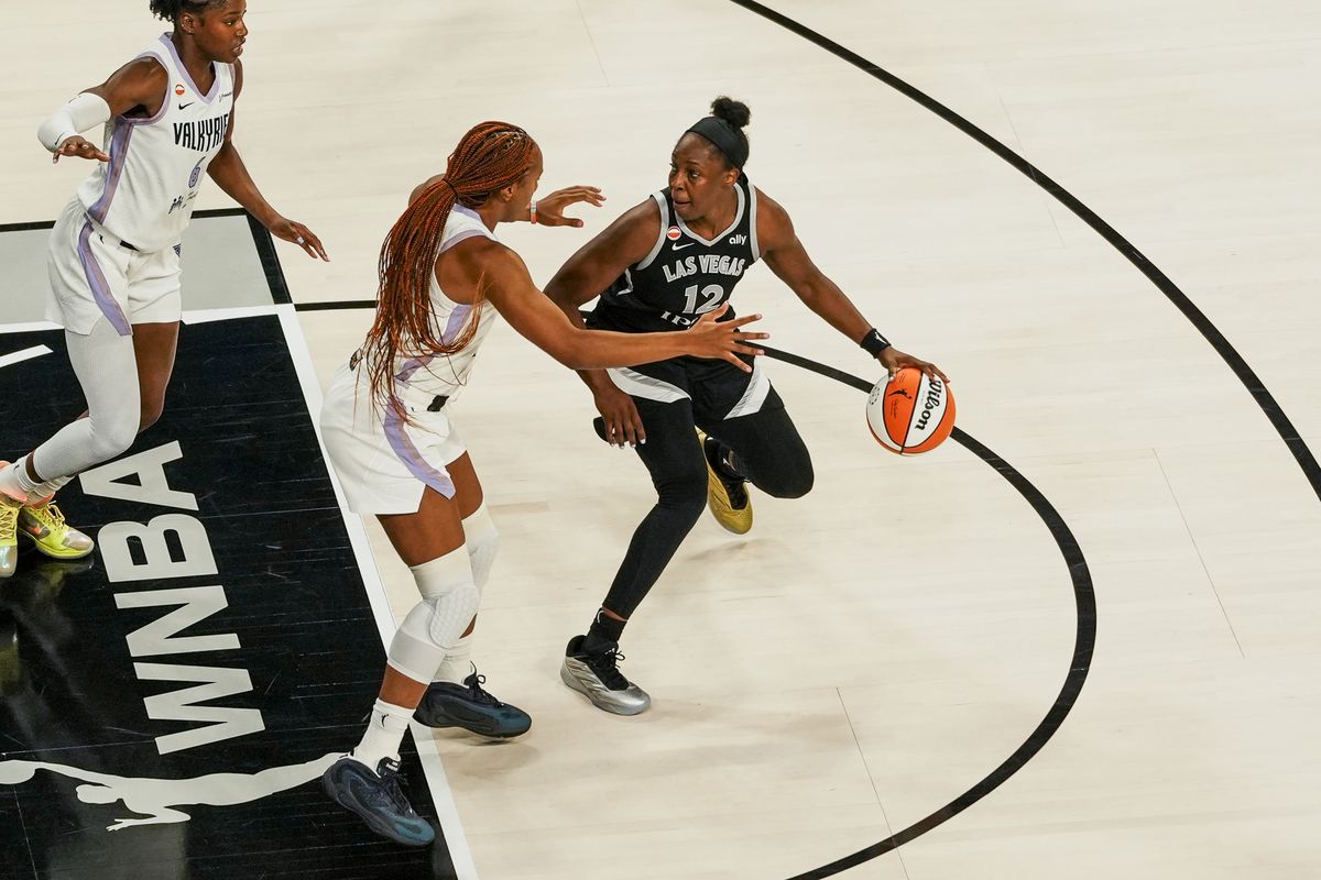 Las Vegas Aces guard Chelsea Gray (12) scans the court, looking past Golden State Valkyries forward Kayla Thornton (5) and Kaila Charles (6) during second quarter of WNBA game against the Golden State Valkyries on Friday October 9, 2026 at Michelob Ultra Arena in Las Vegas. Las Vegas Aces guard Chelsea Gray (12) scans the court, looking past Golden State Valkyries forward Kayla Thornton (5) and Kaila Charles (6) during second quarter of WNBA game against the Golden State Valkyries on Friday October 9, 2026 at Michelob Ultra Arena in Las Vegas.