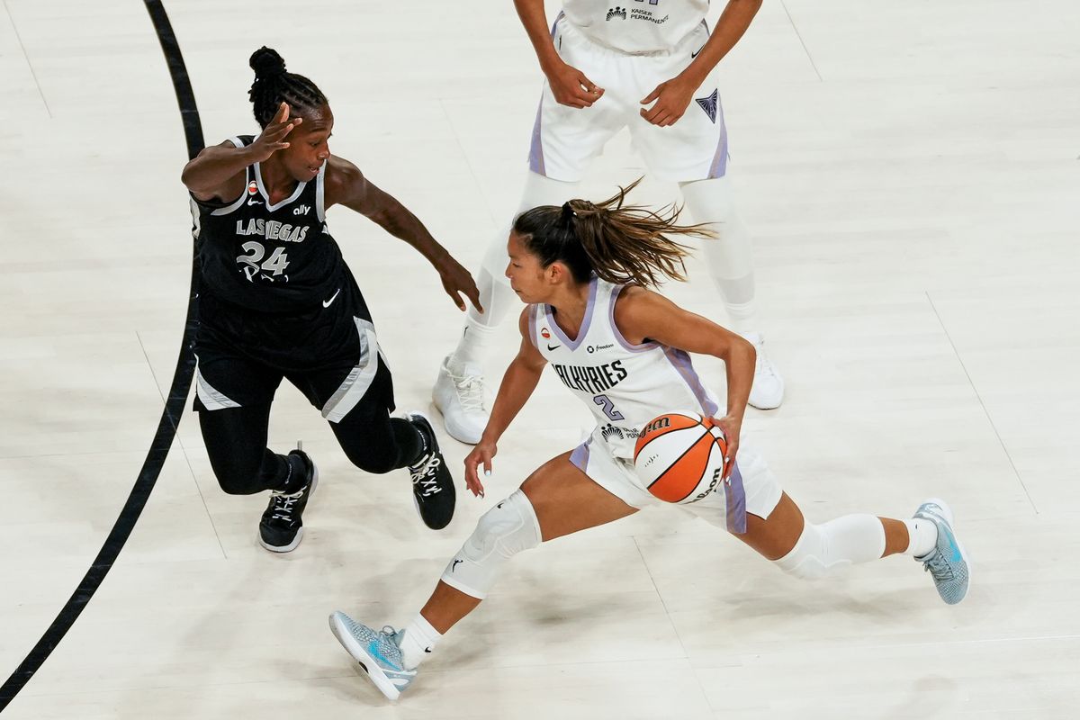 Golden Stake Valkyries guard Kaitlyn Chen (2) takes the ball down the court while guarded by Las Vegas Aces Jewell Loyd (24) during third quarter of WNBA game against the Las Vegas Aces on Friday October 9, 2026 at Michelob Ultra Arena in Las Vegas. Golden Stake Valkyries guard Kaitlyn Chen (2) takes the ball down the court while guarded by Las Vegas Aces Jewell Loyd (24) during third quarter of WNBA game against the Las Vegas Aces on Friday October 9, 2026 at Michelob Ultra Arena in Las Vegas.