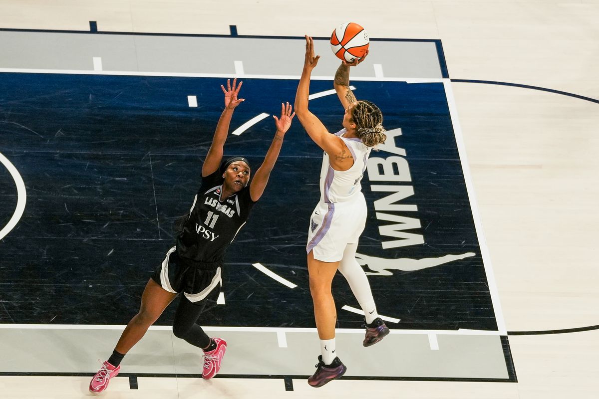 Las Vegas Aces guard Dana Young (11) attempts to block a shot from Golden Stake Valkyries forward Gabby Williams (1) during third quarter of WNBA game against the Golden State Valkyries on Friday October 9, 2026 at Michelob Ultra Arena in Las Vegas. Las Vegas Aces guard Dana Young (11) attempts to block a shot from Golden Stake Valkyries forward Gabby Williams (1) during third quarter of WNBA game against the Golden State Valkyries on Friday October 9, 2026 at Michelob Ultra Arena in Las Vegas.
