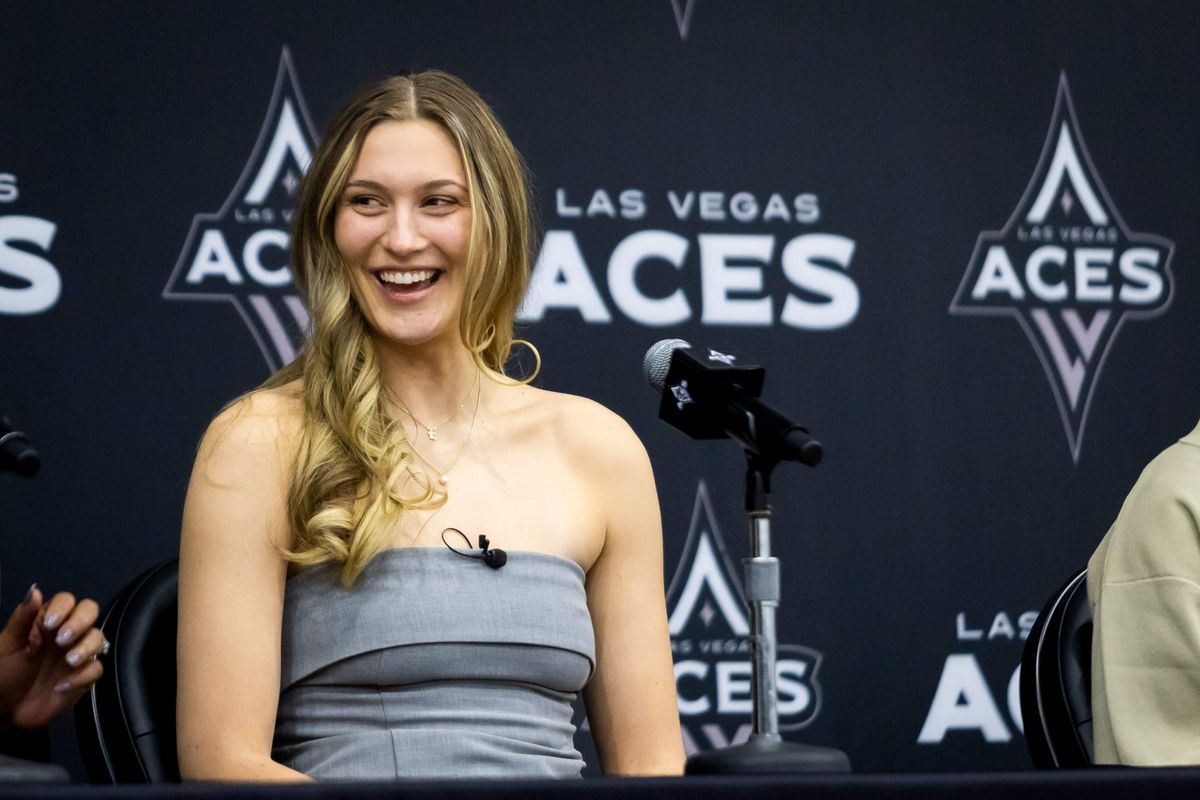 Las Vegas Aces Elizabeth Kitley laughs during an introductory press conference, Tuesday February 25, 2025 in Las Vegas, Nev.