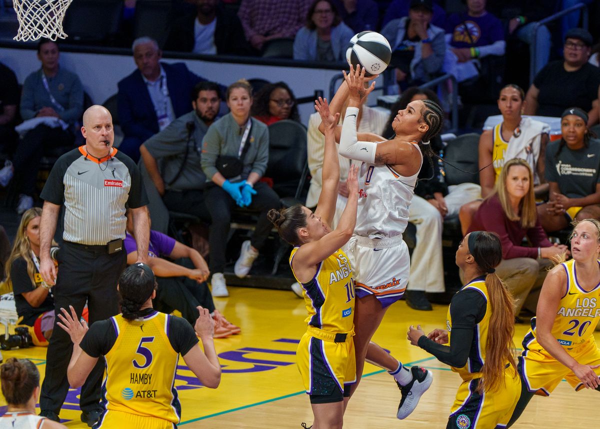 Phoenix Mercury Forward, Satou Sabally 0, leaps for a basket against Kelsey Plum during a WNBA basketball game against the Los Angeles Sparks, Sunday, June 1st, 2025 in Los Angeles. Phoenix Mercury Forward, Satou Sabally 0, leaps for a basket against Kelsey Plum during a WNBA basketball game against the Los Angeles Sparks, Sunday, June 1st, 2025 in Los Angeles.