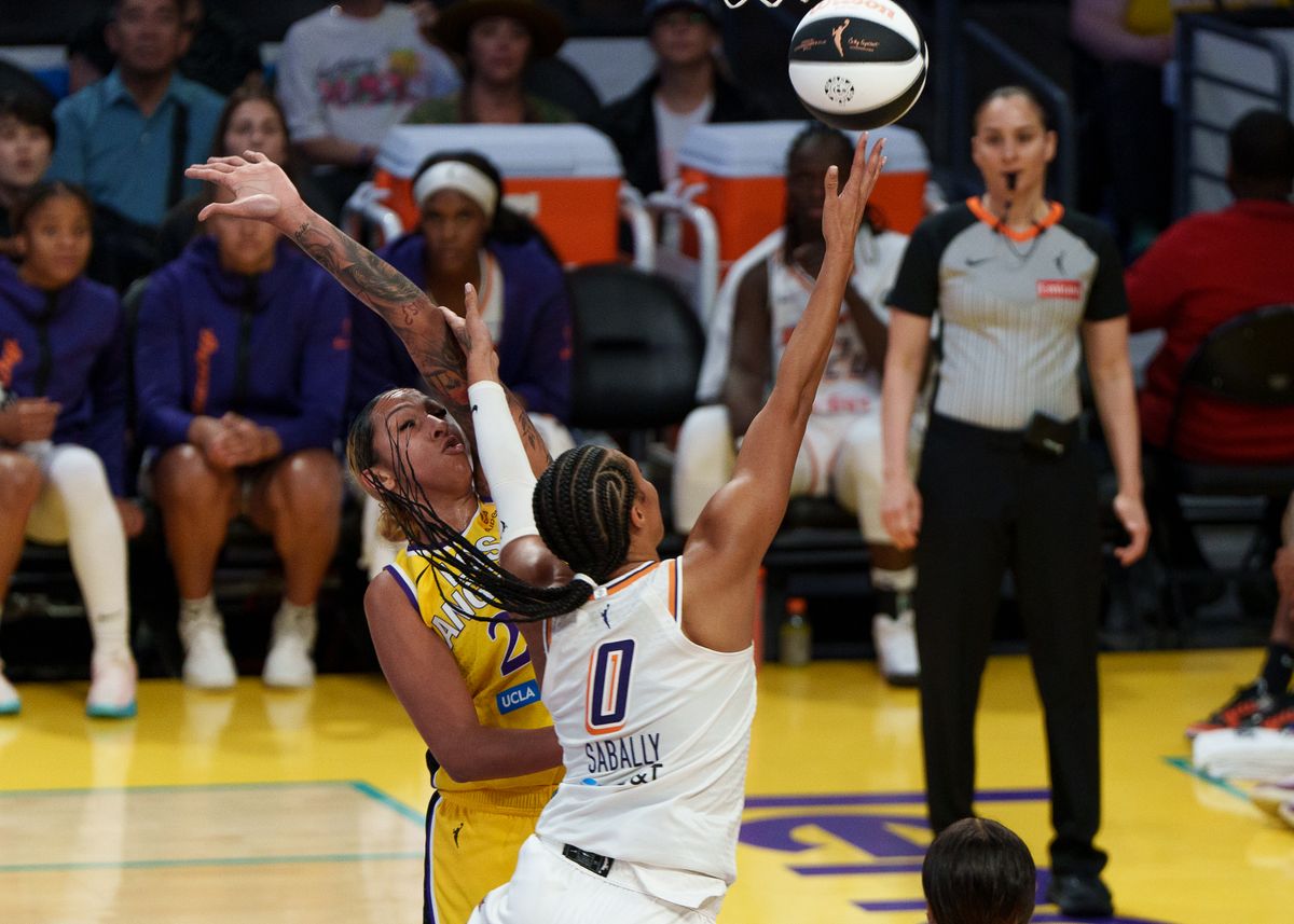 Los Angeles Sparks' Center, Mercedes Russell 21, attempts to block a two-pointer layup during a WNBA basketball game against the Phoenix Mercury on Sunday, June 1st, 2025. Los Angeles Sparks' Center, Mercedes Russell 21, attempts to block a two-pointer layup during a WNBA basketball game against the Phoenix Mercury on Sunday, June 1st, 2025.