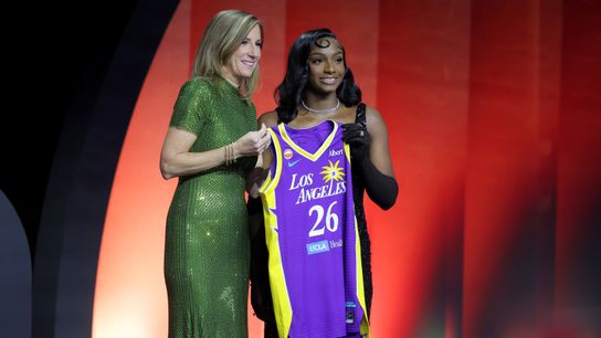 Apr 13, 2026; New York, NY, USA; WNBA Commissioner Cathy Engelbert (left) poses for photos with Ta'Niya Latson who was selected twentieth overall by the Los Angeles Sparks during the 2026 WNBA Draft at The Shed at Hudson Yards.