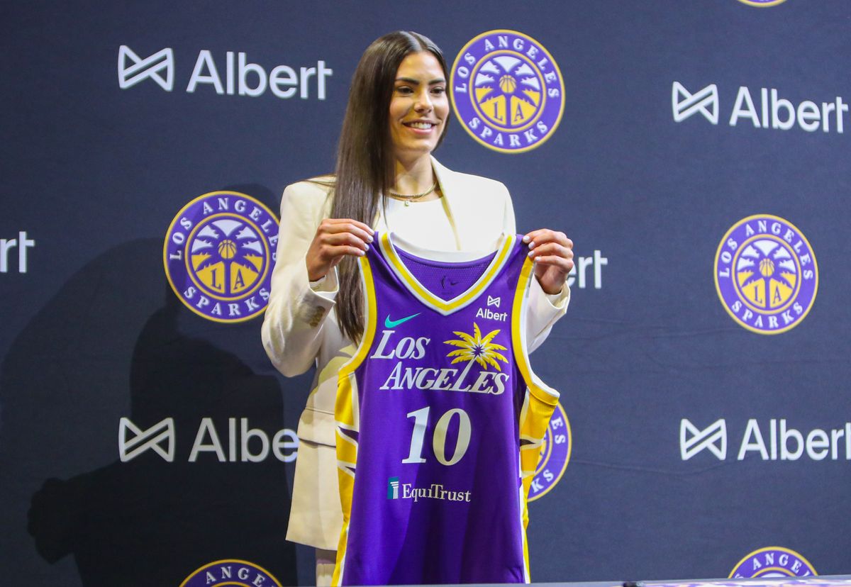 #10 Kelsey Plum of the Los Angeles Sparks poses with her jersey during an introductory press conference at Crypto.com Arena on February 12, 2025 in Los Angeles, CA. #10 Kelsey Plum of the Los Angeles Sparks poses with her jersey during an introductory press conference at Crypto.com Arena on February 12, 2025 in Los Angeles, CA.