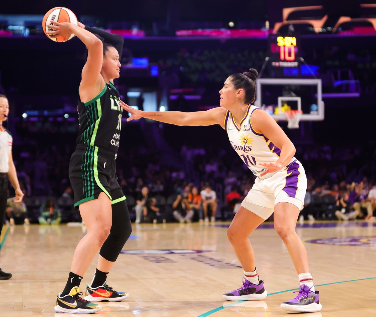 #10 Kelsey Plum of the Los Angeles Sparks defends against the Minnesota Lynx on July 10, 2025 in Los Angeles, CA. #10 Kelsey Plum of the Los Angeles Sparks defends against the Minnesota Lynx on July 10, 2025 in Los Angeles, CA.