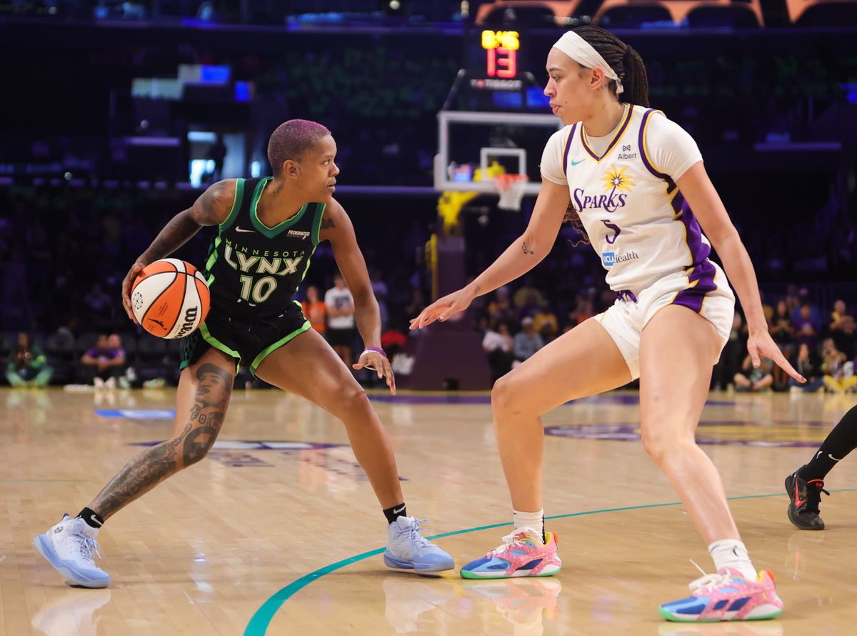 #5 Dearica Hamby of the Los Angeles Sparks defends against the Minnesota Lynx on July 10, 2025 in Los Angeles, CA. #5 Dearica Hamby of the Los Angeles Sparks defends against the Minnesota Lynx on July 10, 2025 in Los Angeles, CA.