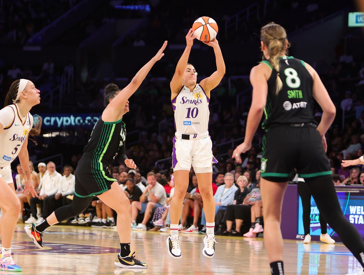 #10 Kelsey Plum of the Los Angeles Sparks shoots a jumpshot against the Minnesota Lynx on July 10, 2025 in Los Angeles, CA. #10 Kelsey Plum of the Los Angeles Sparks shoots a jumpshot against the Minnesota Lynx on July 10, 2025 in Los Angeles, CA.