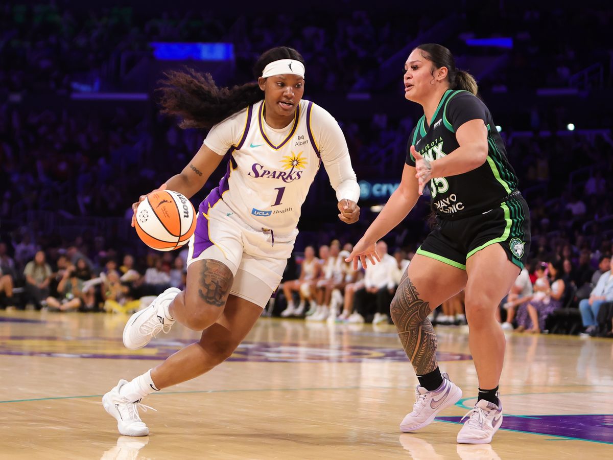 #1 Sania Feagin drives the lane against the Minnesota Lynx on July 10, 2025 in Los Angeles, CA. #1 Sania Feagin drives the lane against the Minnesota Lynx on July 10, 2025 in Los Angeles, CA.