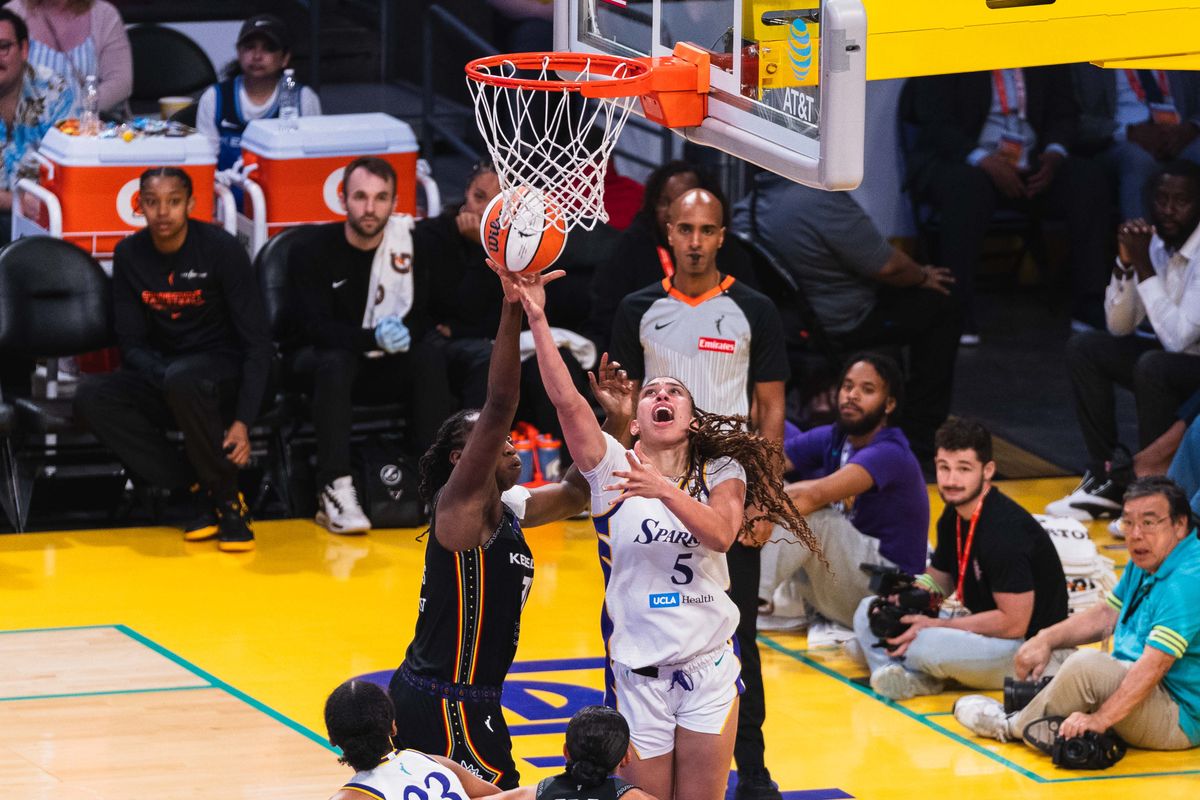 LA Sparks forward Dearica Hamby (5), scores on the put back at a WNBA basketball game against the Connecticut Suns, Sunday July 13th, 2025 in Los Angeles, California. 