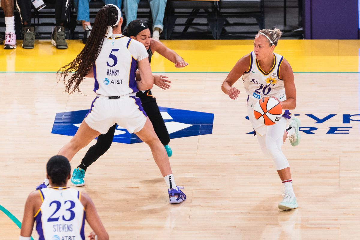 LA Sparks guard Julie Allemand (20), coming off the screen at a WNBA basketball game against the Connecticut Suns, Sunday July 13th, 2025 in Los Angeles, California. 
