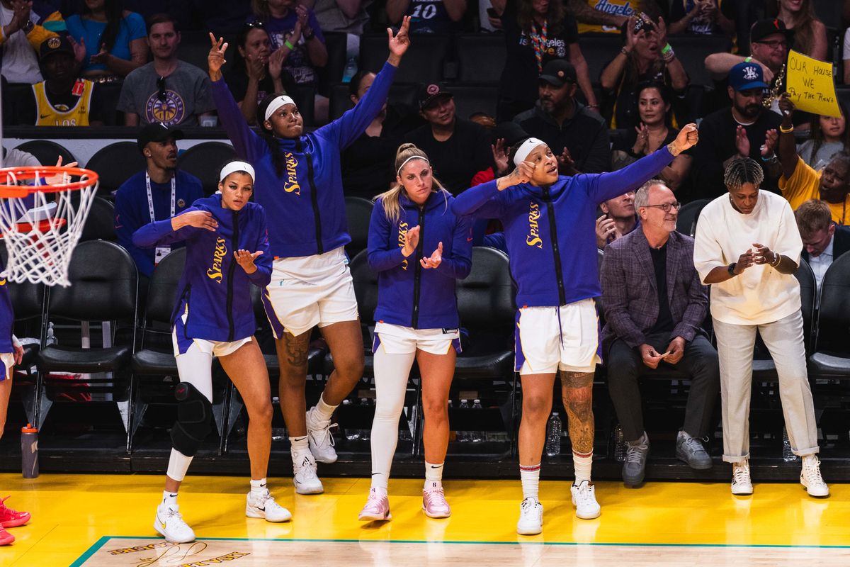 LA Sparks bench celebrates a made three pointer at a WNBA basketball game against the Connecticut Suns, Sunday July 13th, 2025 in Los Angeles, California. 