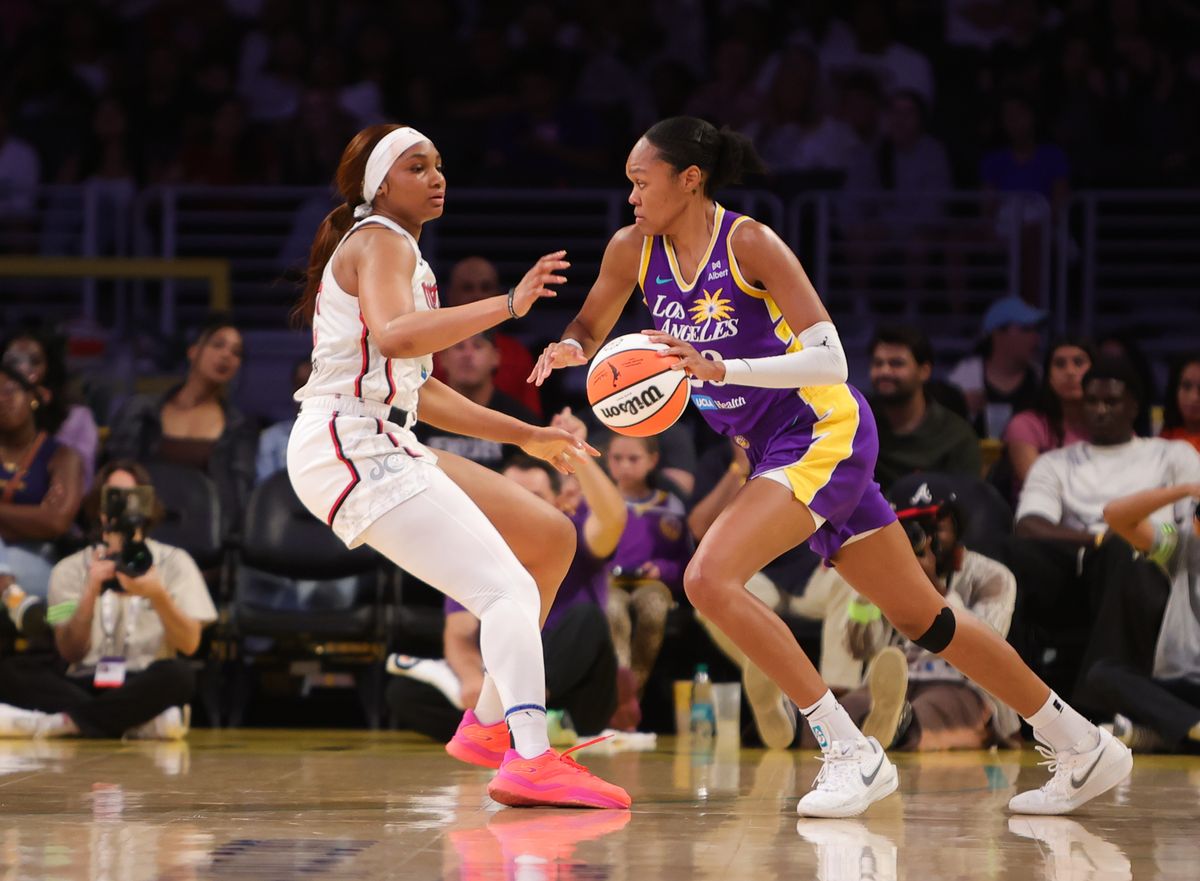 #23 Azura Stevens of the Los Angeles Sparks dribbles the ball against the Washington Mystics on July 15, 2025 in Los Angeles, CA.