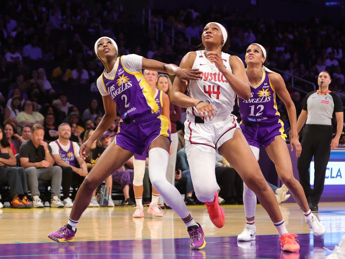 #2 Rickea Jackson of the Los Angeles Sparks battles for position against the Washington Mystics on July 15, 2025 in Los Angeles, CA.