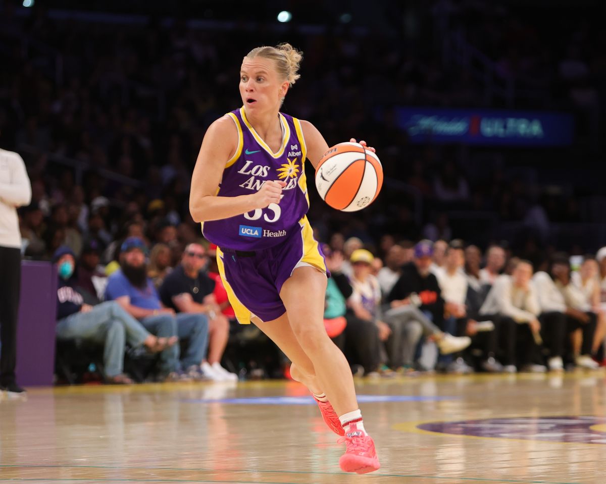 #35 Julie Vanloo of the Los Angeles Sparks dribbles the ball up court against the Washington Mystics on July 15, 2025 in Los Angeles, CA.