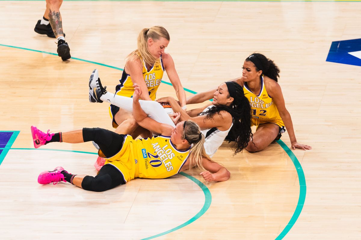 LA Sparks fighting for possession at a WNBA basketball game against the Las Vegas Aces, Sunday July 29th, 2025 in Los Angeles, California. 