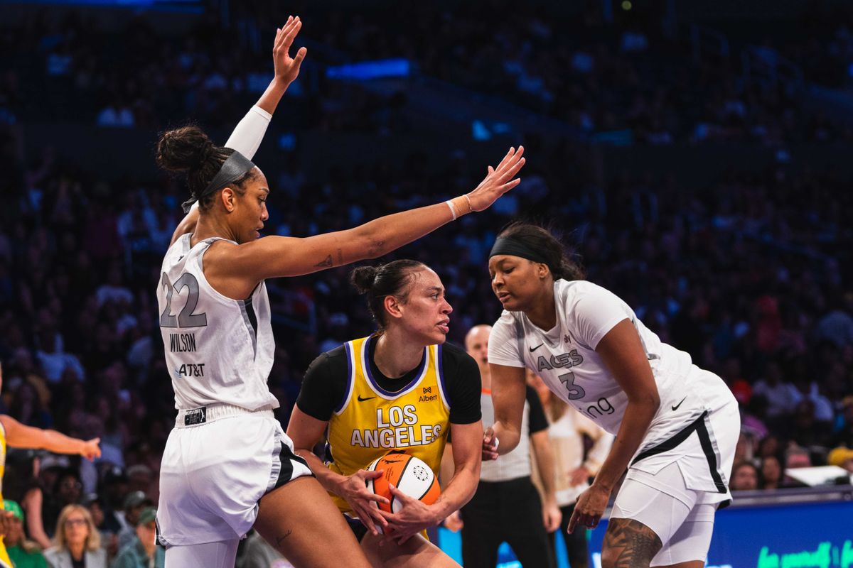 LA Sparks forward Dearica Hamby (5), looking for the open teammate at a WNBA basketball game against the Las Vegas Aces, Tuesday July 29th, 2025 in Los Angeles, California. 