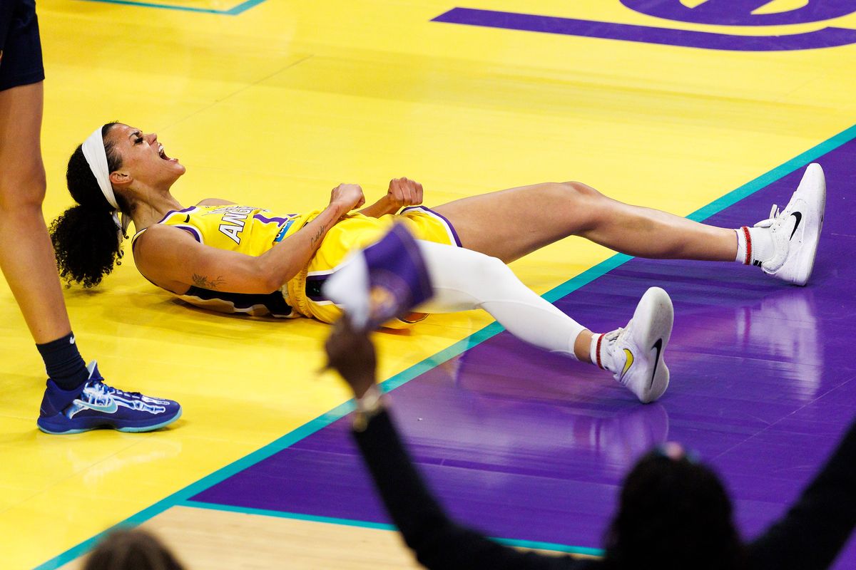 Rae Burrell #12 of the Los Angeles Sparks celebrates during the game against the Indiana Fever at Crypto.com Arena on August 5, 2025 in Los Angeles, California. Rae Burrell #12 of the Los Angeles Sparks celebrates during the game against the Indiana Fever at Crypto.com Arena on August 5, 2025 in Los Angeles, California.