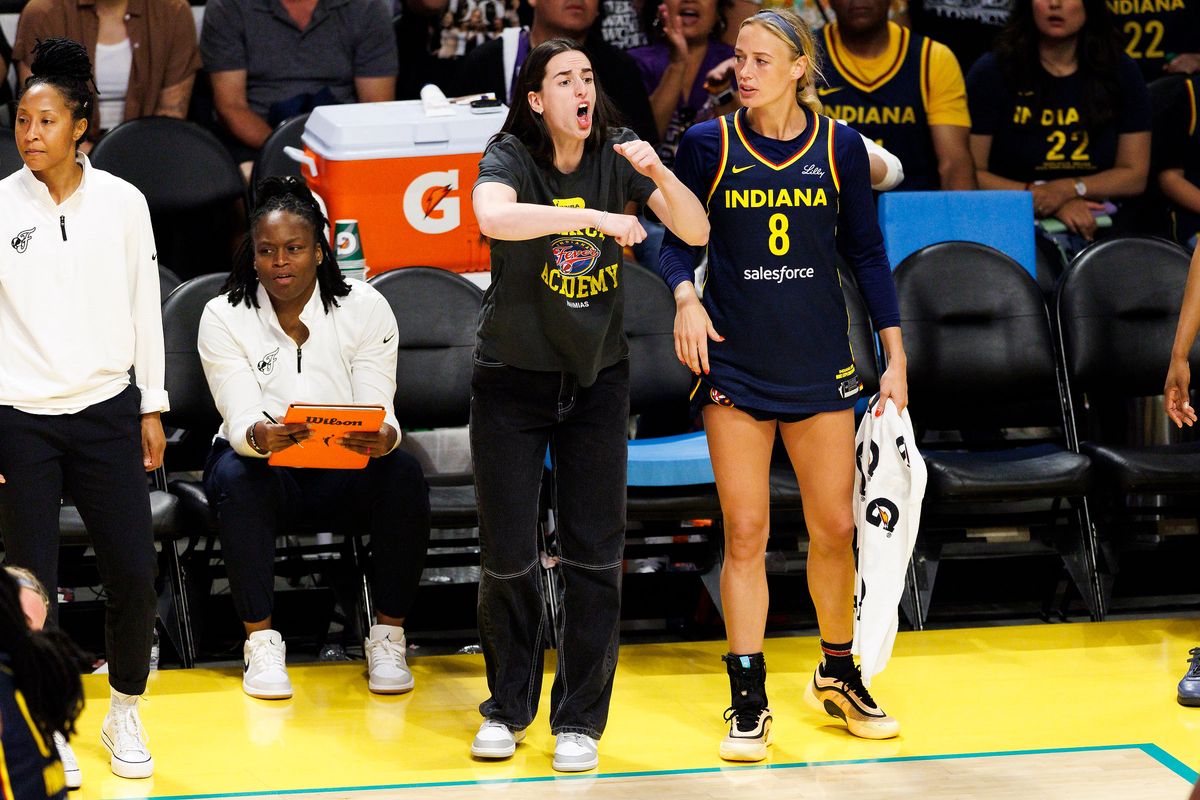 Caitlin Clark #22 of the Indiana Fever signals for a call on the bench during the game against the Los Angeles Sparks at Crypto.com Arena on August 5, 2025 in Los Angeles, California. Caitlin Clark #22 of the Indiana Fever signals for a call on the bench during the game against the Los Angeles Sparks at Crypto.com Arena on August 5, 2025 in Los Angeles, California.