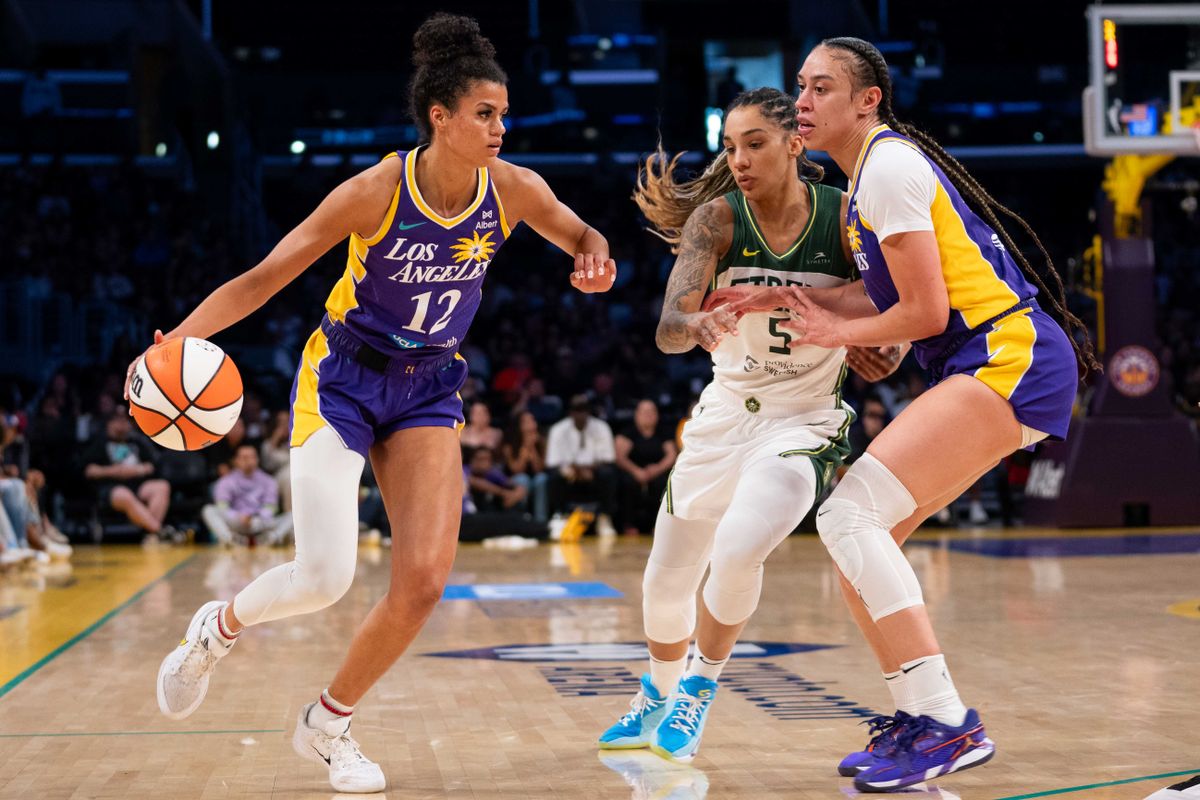 LA Sparks guard Rae Burrell (12), looks to score at a WNBA basketball game against the Seattle Storm, Sunday August 10th, 2025 in Los Angeles, California. 