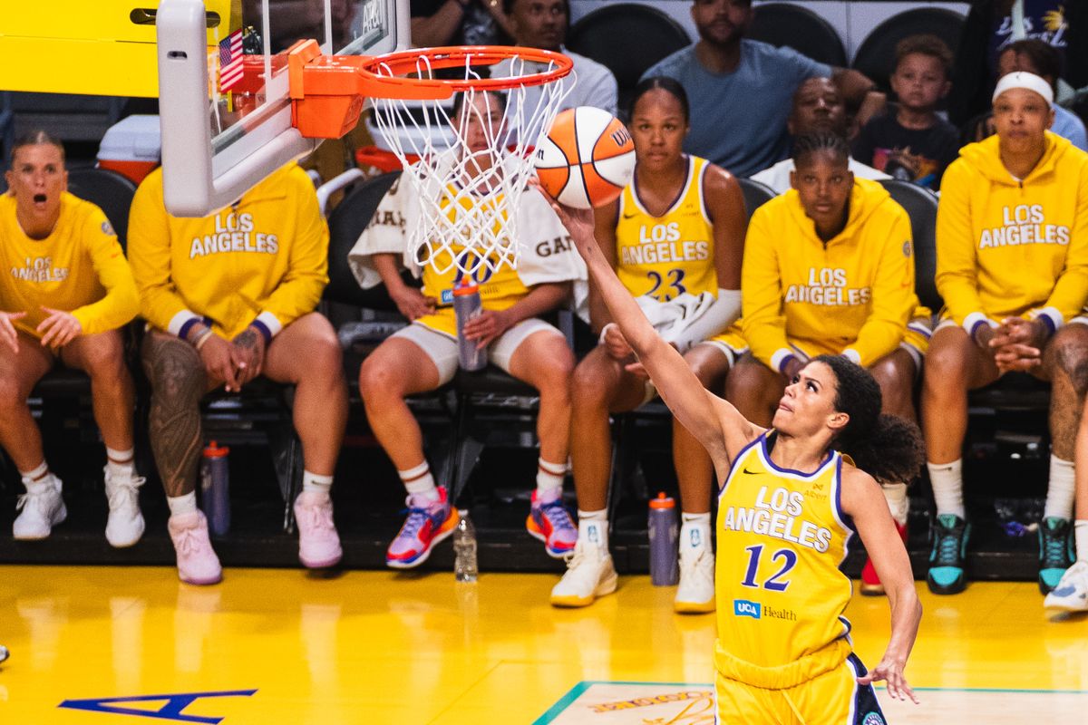 LA Sparks guard Rae Burrel (12) taking a lay-up at a WNBA basketball game against the Indiana Fever, Friday August 29th, 2025 in Los Angeles, California. 