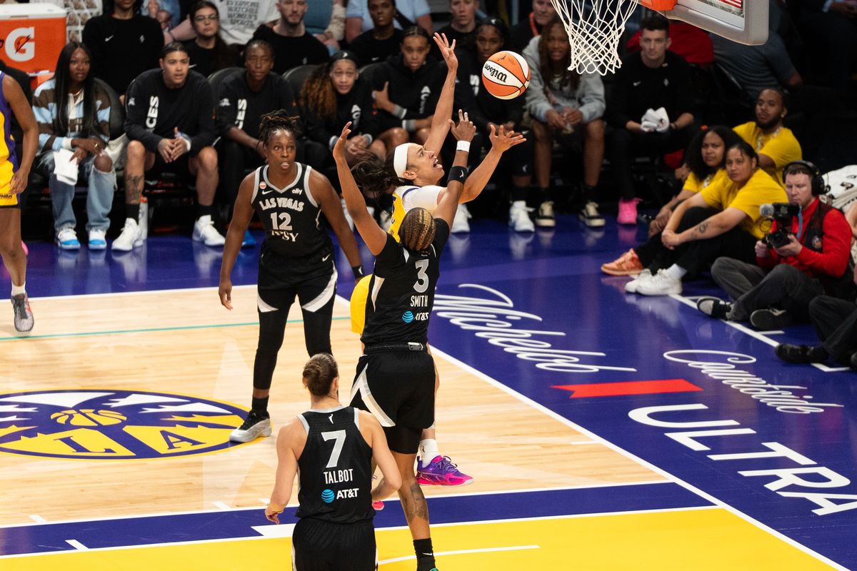 LA Sparks forward Dearica Hamby (5) attacks the rim and gets fouled during a WNBA basketball game against the Las Vegas Aces, Sunday May 10th, 2026 in Los Angeles, California. LA Sparks forward Dearica Hamby (5) attacks the rim and gets fouled during a WNBA basketball game against the Las Vegas Aces, Sunday May 10th, 2026 in Los Angeles, California.