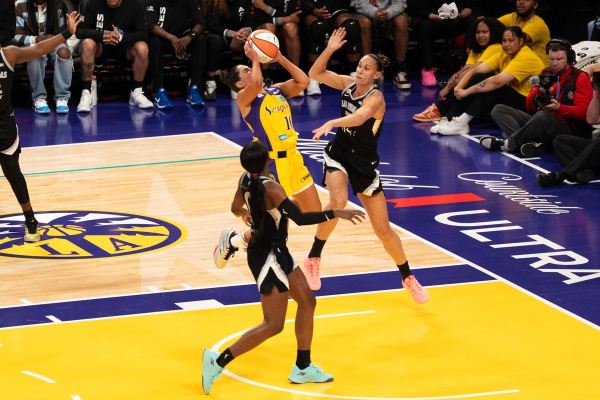 LA Sparks guard Kelsey Plum (10) attacks the rim and scores on two defenders during a WNBA basketball game against the Las Vegas Aces, Sunday May 10th, 2026 in Los Angeles, California. LA Sparks guard Kelsey Plum (10) attacks the rim and scores on two defenders during a WNBA basketball game against the Las Vegas Aces, Sunday May 10th, 2026 in Los Angeles, California.