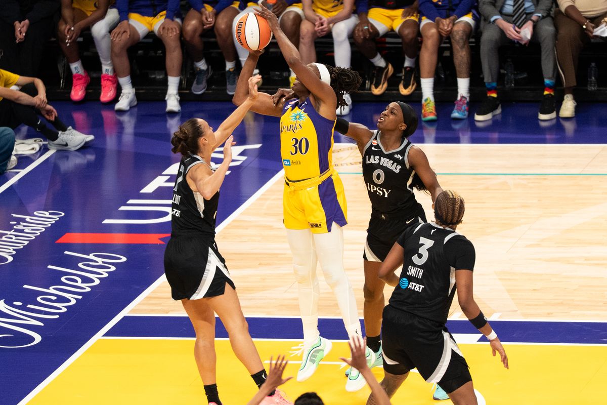 LA Sparks forward Nneka Ogwumike (30) scores while her shoulder is being grabbed during a WNBA basketball game against the Las Vegas Aces, Sunday May 10th, 2026 in Los Angeles, California. LA Sparks forward Nneka Ogwumike (30) scores while her shoulder is being grabbed during a WNBA basketball game against the Las Vegas Aces, Sunday May 10th, 2026 in Los Angeles, California.