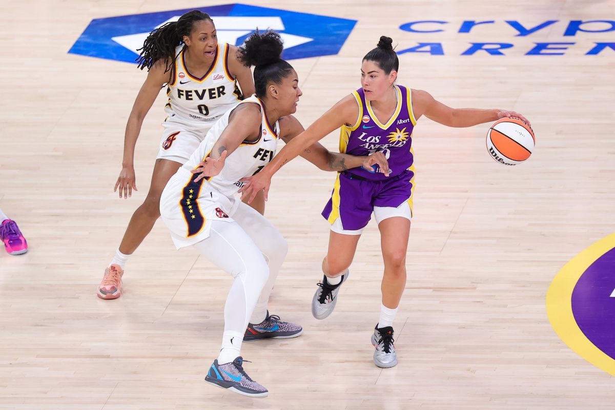 Los Angeles Sparks guard Kelsey Plum (9) dribbles the basketball during a WNBA game against the Indiana Fever on May 13, 2026 in Los Angeles, CA. Los Angeles Sparks guard Kelsey Plum (9) dribbles the basketball during a WNBA game against the Indiana Fever on May 13, 2026 in Los Angeles, CA.