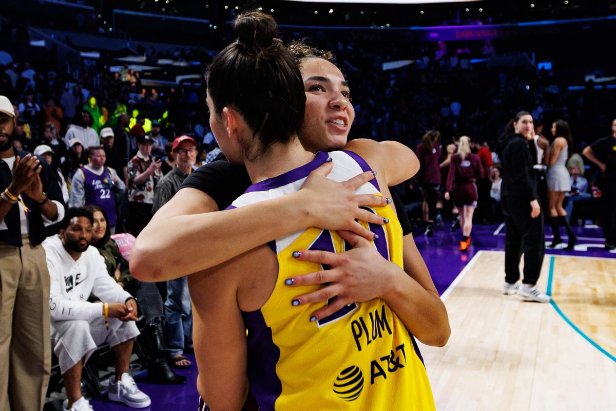 Kelsey Plum #10 of the Los Angeles Sparks hugs Kiki Rice #1 of the Toronto Tempo after a WNBA game against the Toronto Tempo on May 15, 2026 at Crypto.com Arena in Los Angeles, California.