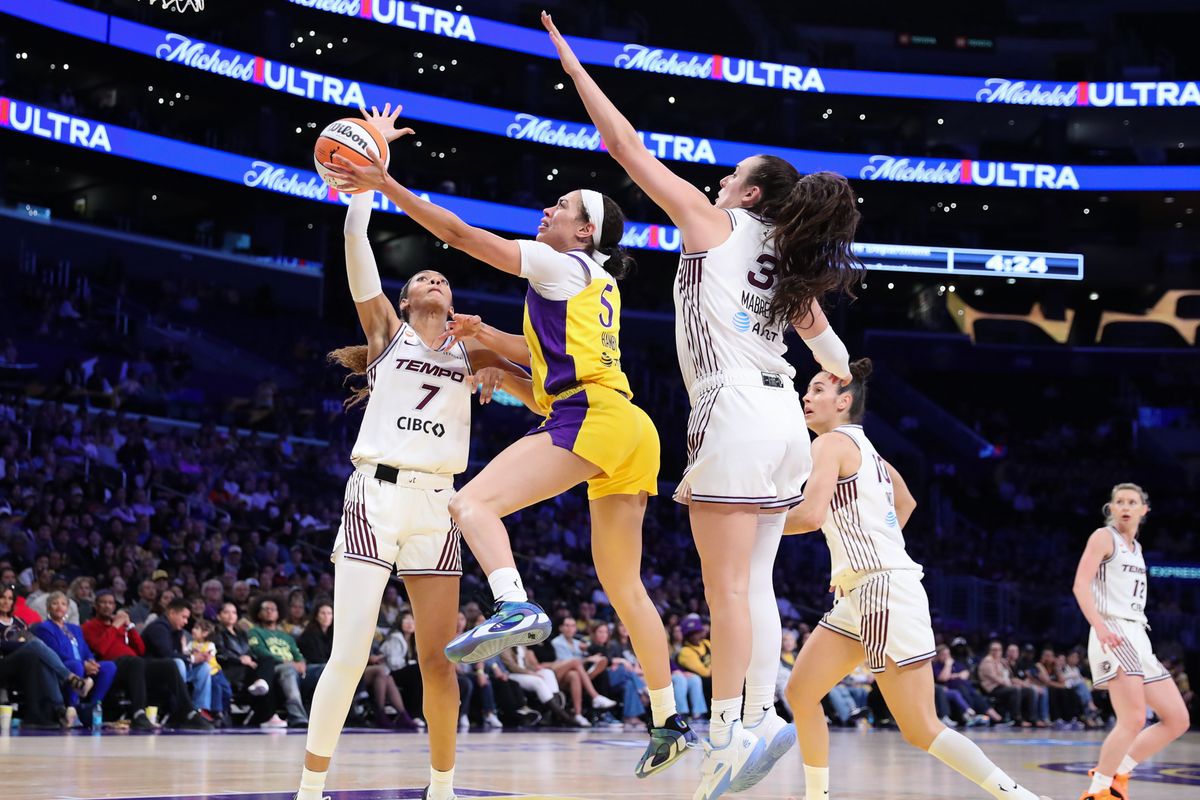 Los Angeles Sparks forward Dearica Hamby (5) drives the lane during a WNBA game against the Toronto Tempo on May 17, 2026 in Los Angeles, CA.