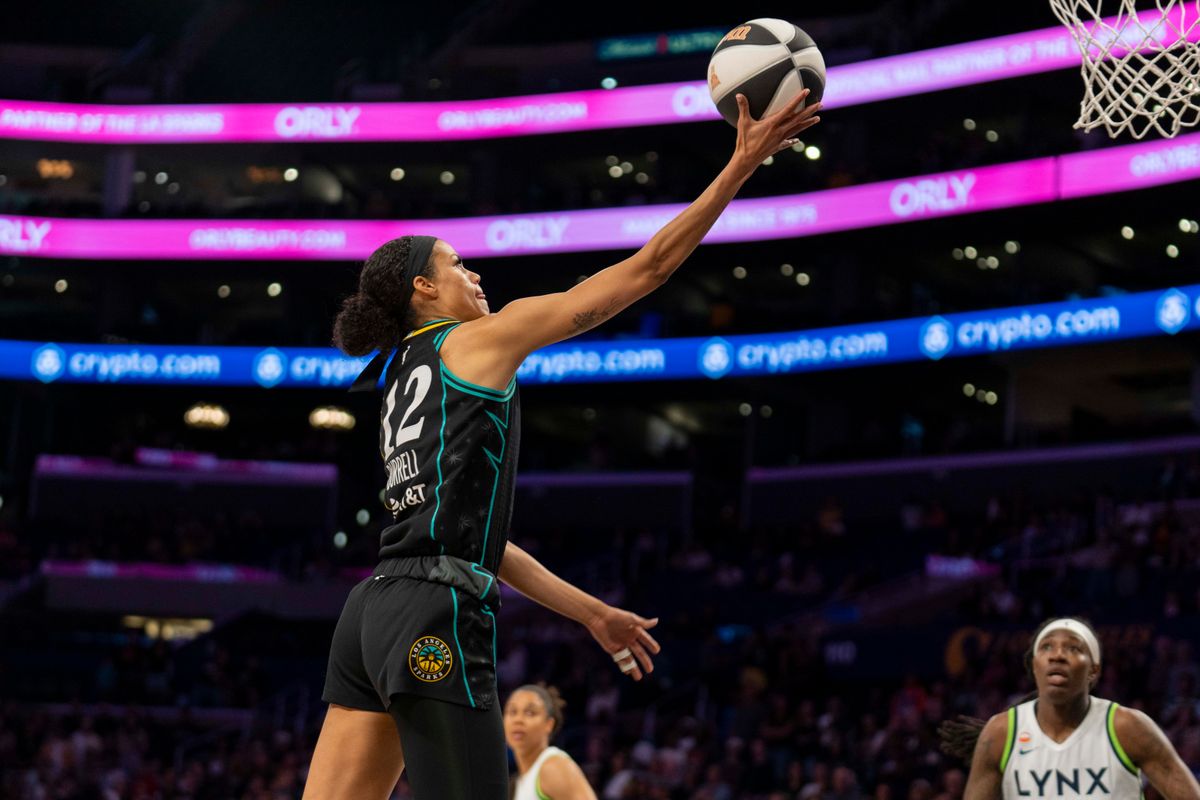 Los Angeles Sparks forward Rae Burrell (12) scores the layup during a WNBA game against the Minnesota Lynx, Wednesday June 17th, 2026 in Los Angeles, California. Los Angeles Sparks forward Rae Burrell (12) scores the layup during a WNBA game against the Minnesota Lynx, Wednesday June 17th, 2026 in Los Angeles, California.