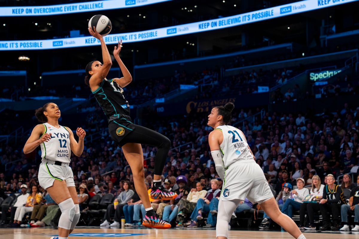 Los Angeles Sparks forward Rae Burrell (12) shoots a fadeaway jumper during a WNBA game against the Minnesota Lynx, Wednesday June 17th, 2026 in Los Angeles, California. Los Angeles Sparks forward Rae Burrell (12) shoots a fadeaway jumper during a WNBA game against the Minnesota Lynx, Wednesday June 17th, 2026 in Los Angeles, California.
