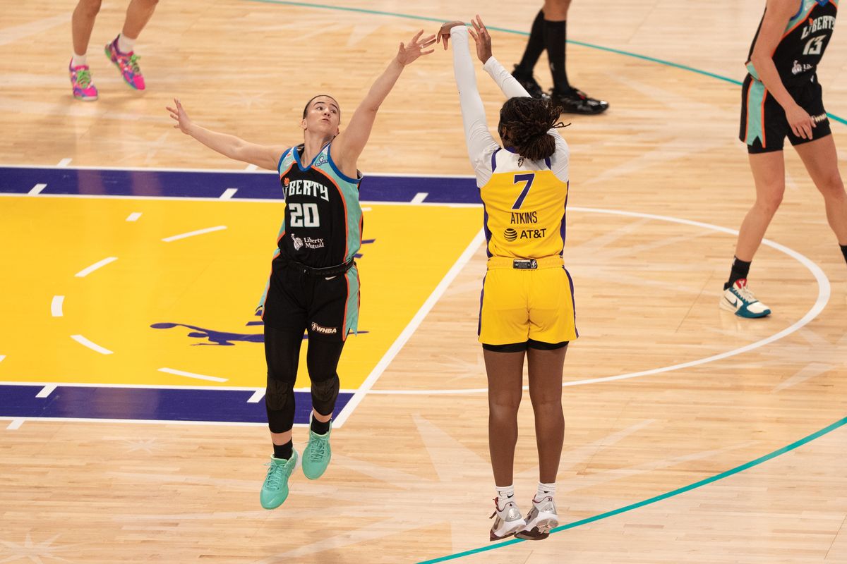 Los Angeles Sparks Guard Ariel Atkins (7) shot a contested three during a WNBA game against the New York Liberty, Sunday June 21st, 2026 in Los Angeles, California. Los Angeles Sparks Guard Ariel Atkins (7) shot a contested three during a WNBA game against the New York Liberty, Sunday June 21st, 2026 in Los Angeles, California.