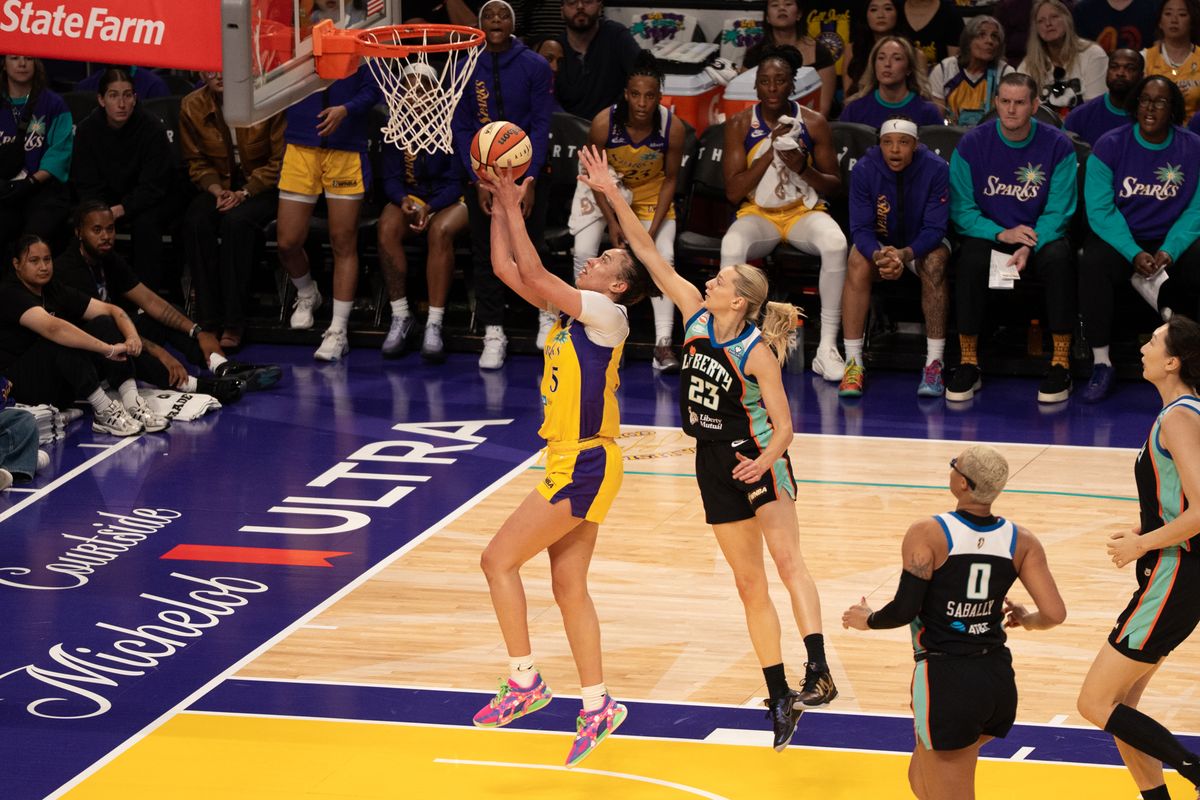 Los Angeles Sparks Forward Dearica Hamby (5) scored on a fast break lay up during a WNBA game against the New York Liberty, Sunday June 21st, 2026 in Los Angeles, California. Los Angeles Sparks Forward Dearica Hamby (5) scored on a fast break lay up during a WNBA game against the New York Liberty, Sunday June 21st, 2026 in Los Angeles, California.