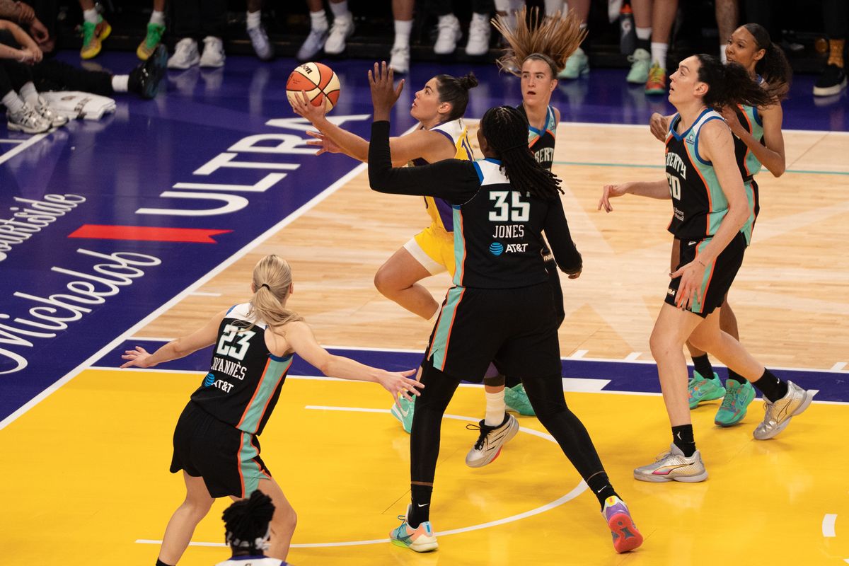 Los Angeles Sparks Guard Kelsey Plum (10) blows past her defender and scores a contested lay up during a WNBA game against the New York Liberty, Sunday June 21st, 2026 in Los Angeles, California. Los Angeles Sparks Guard Kelsey Plum (10) blows past her defender and scores a contested lay up during a WNBA game against the New York Liberty, Sunday June 21st, 2026 in Los Angeles, California.