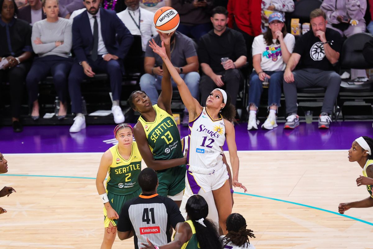 Rae Burrell #12 of the Los Angeles Sparks and Ezi Magbegor #13 of the Seattle Storm battle for the jump ball during a WNBA game on July 6, 2026 in Los Angeles, CA. Rae Burrell #12 of the Los Angeles Sparks and Ezi Magbegor #13 of the Seattle Storm battle for the jump ball during a WNBA game on July 6, 2026 in Los Angeles, CA.