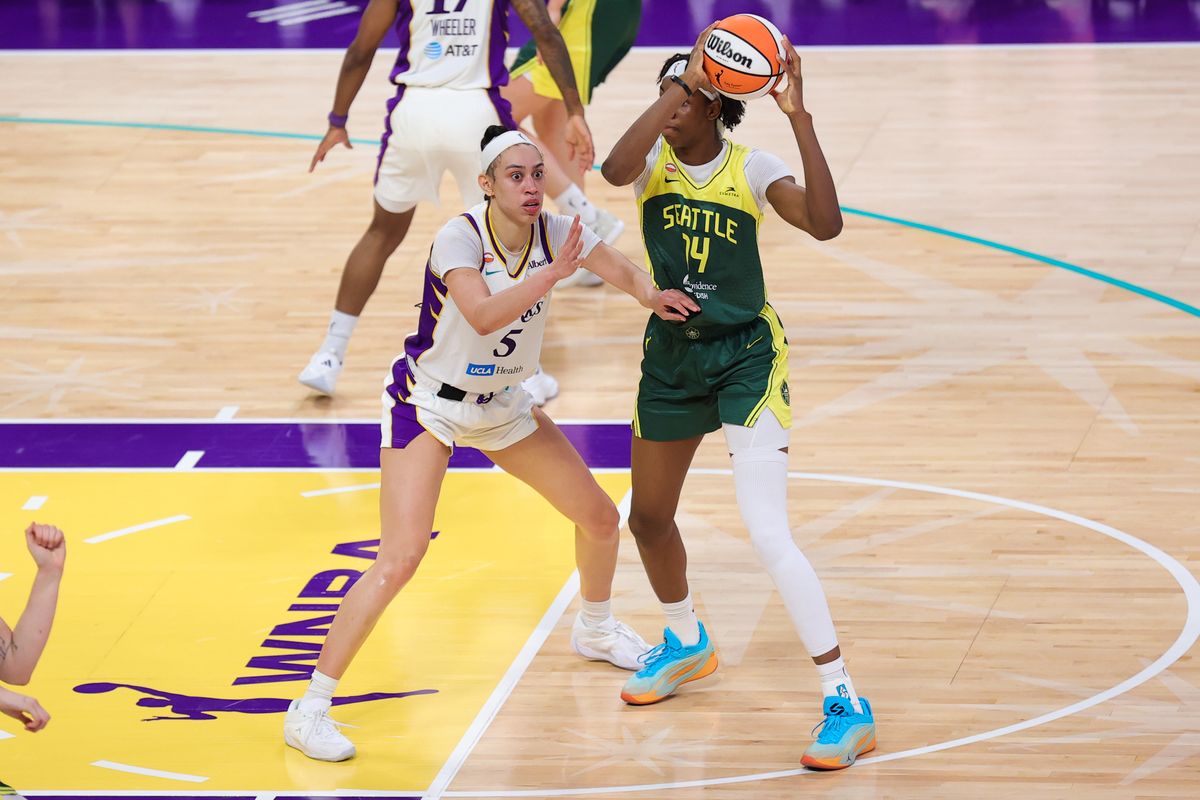 Dearica Hamby #5 of the Los Angeles Sparks defends against Dominique Malonga #14 of the Seattle Storm during a WNBA game on July 6, 2026 in Los Angeles, CA. Dearica Hamby #5 of the Los Angeles Sparks defends against Dominique Malonga #14 of the Seattle Storm during a WNBA game on July 6, 2026 in Los Angeles, CA.