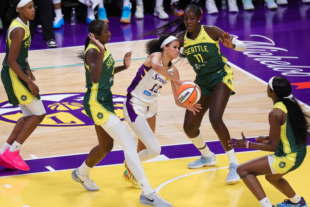 Rae Burrell #12 of the Los Angeles Sparks passes the basketball during a WNBA game against the Seattle Storm on July 6, 2026 in Los Angeles, CA. Rae Burrell #12 of the Los Angeles Sparks passes the basketball during a WNBA game against the Seattle Storm on July 6, 2026 in Los Angeles, CA.