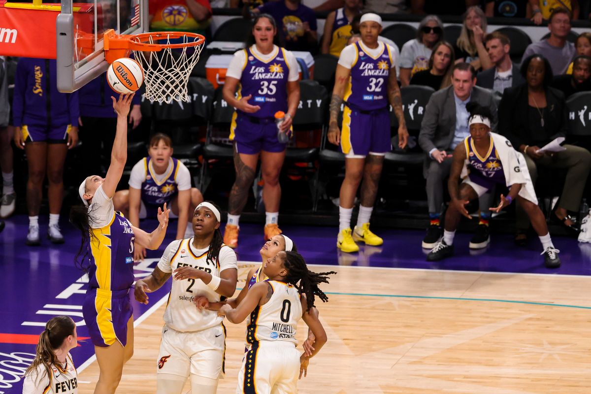 Dearica Hamby #5 of the Los Angeles Sparks lays the ball up as the Sparks bench looks on during a WNBA game against the Indiana Fever, Wednesday July 8, 2026 in Inglewood, Calif. Dearica Hamby #5 of the Los Angeles Sparks lays the ball up as the Sparks bench looks on during a WNBA game against the Indiana Fever, Wednesday July 8, 2026 in Inglewood, Calif.