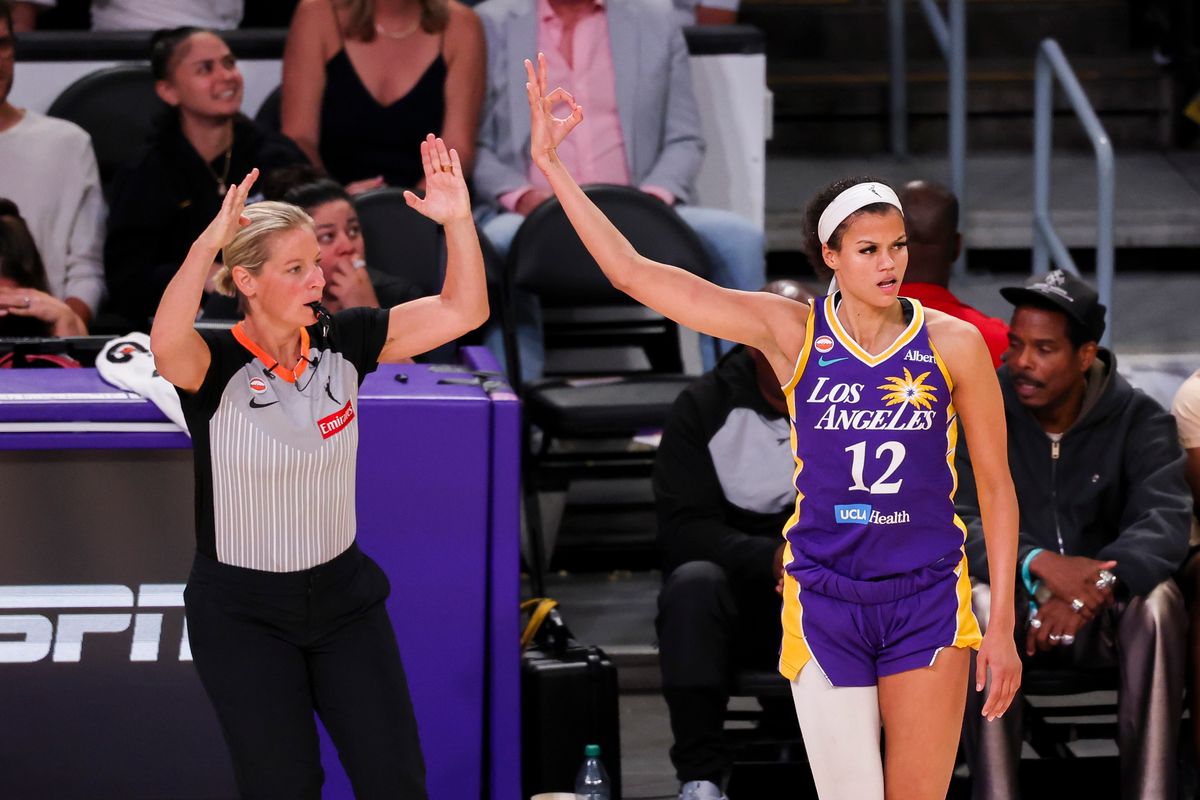 Rae Burrell #12 of the Los Angeles Sparks celebrates a made three point shot during a WNBA game against the Indiana Fever, Wednesday July 8, 2026 in Inglewood, Calif. Rae Burrell #12 of the Los Angeles Sparks celebrates a made three point shot during a WNBA game against the Indiana Fever, Wednesday July 8, 2026 in Inglewood, Calif.